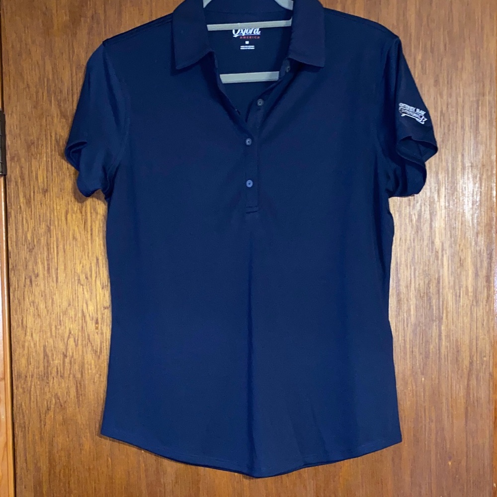 Montego Bay Invitational Women’s Button Oxford Down Shirt.